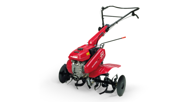Motozappa compatta, inquadratura di tre quarti, lato sinistro.