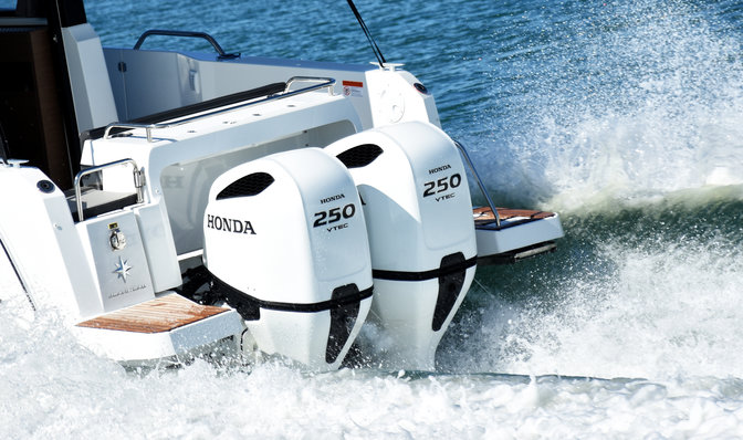 Side facing boat with Honda marine engine.