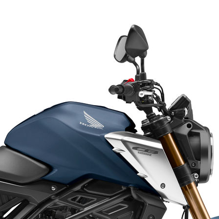 Honda CB125R, lato destro, primo piano su serbatoio e manubrio, scatto in studio, moto blu