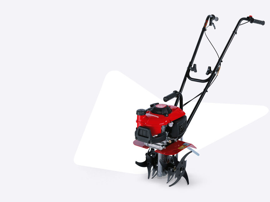 Micro-motozappe Honda con diversi accessori.